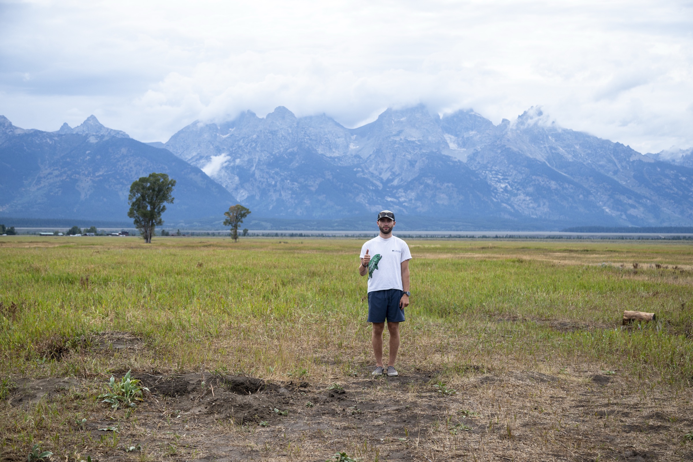 Thumbs up in front of the Grand Tetons, Wyoming